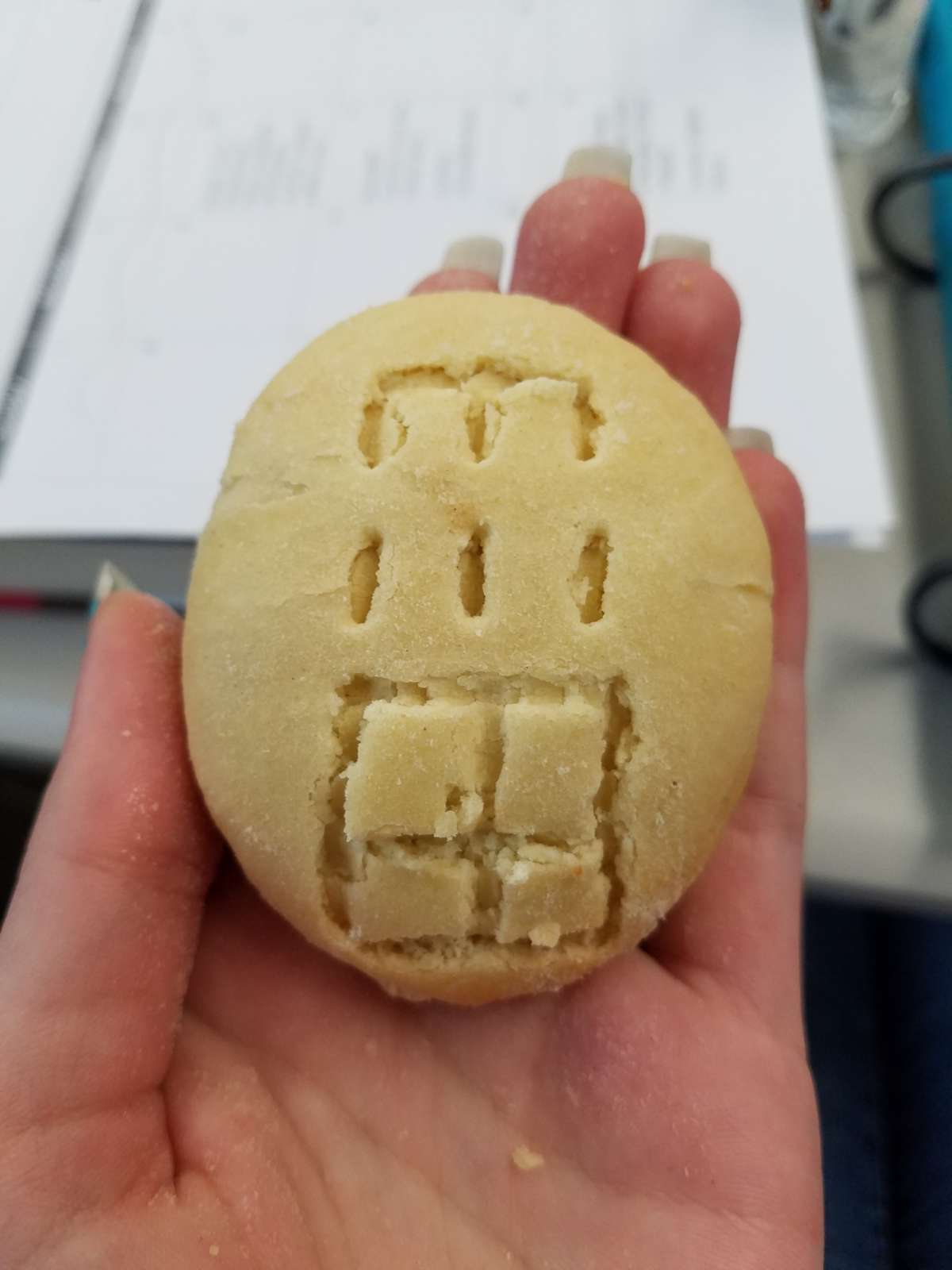 Sugar cookie incised with oracle bone symbols for rain and field